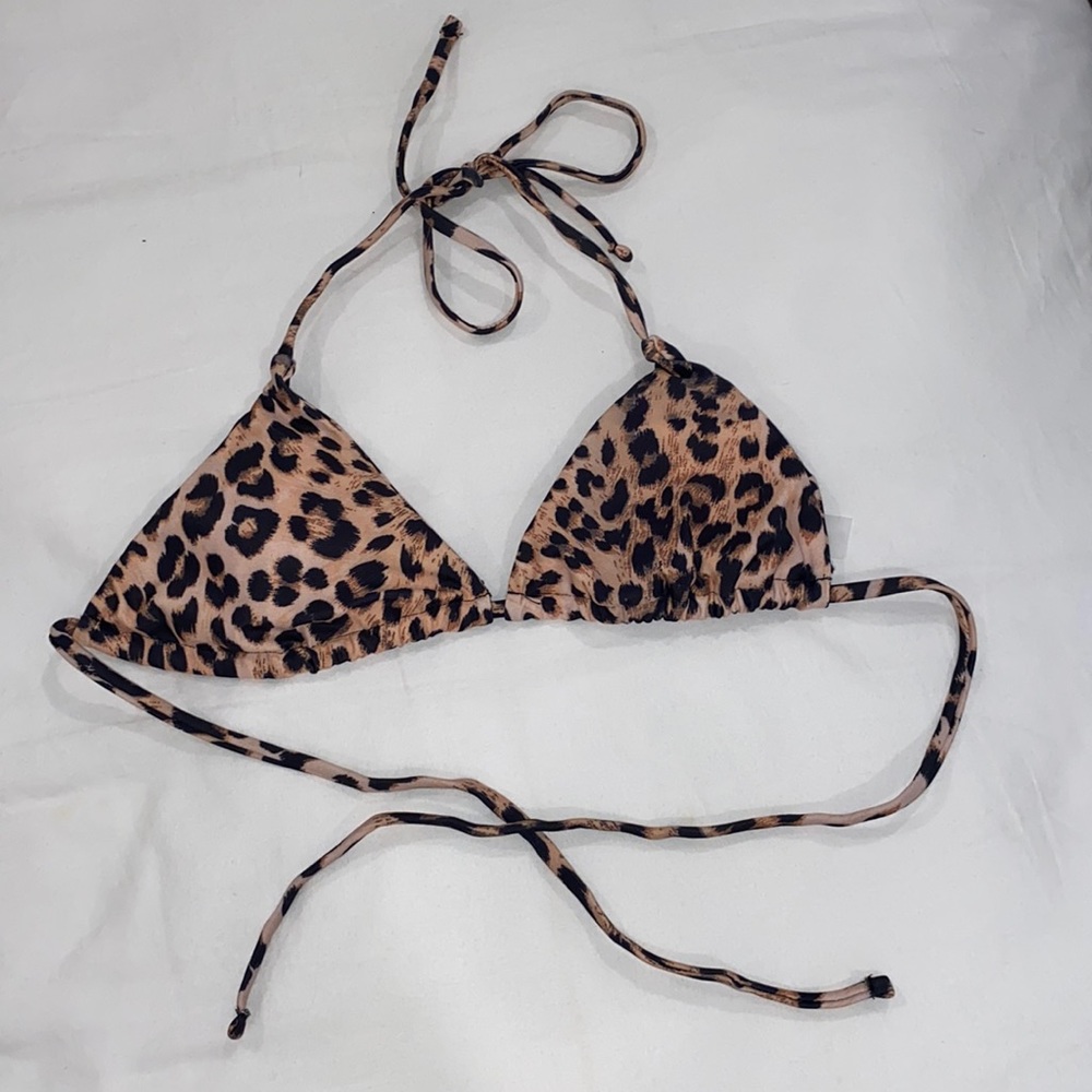 Brand new, cheetah Bikini top. Size medium.